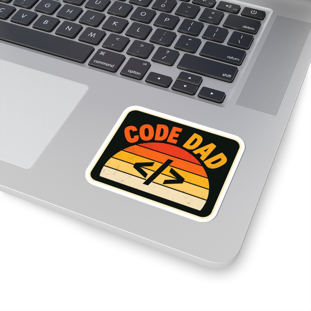 Code Dad sticker, 3 inch, on a laptop