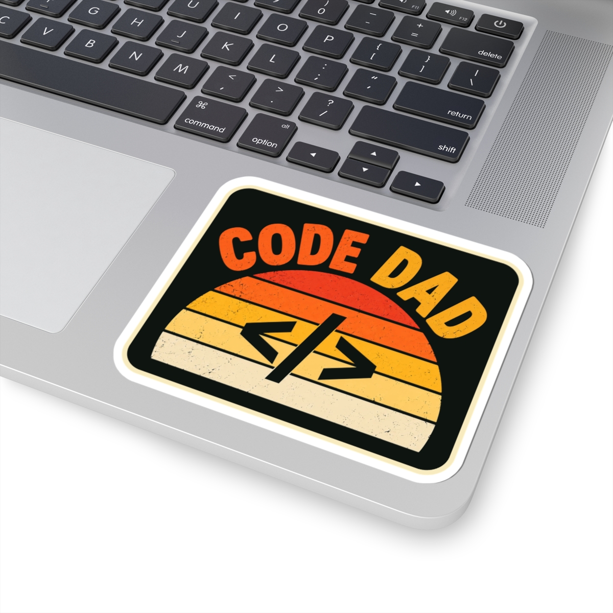Code Dad sticker, 4 inch, on a laptop